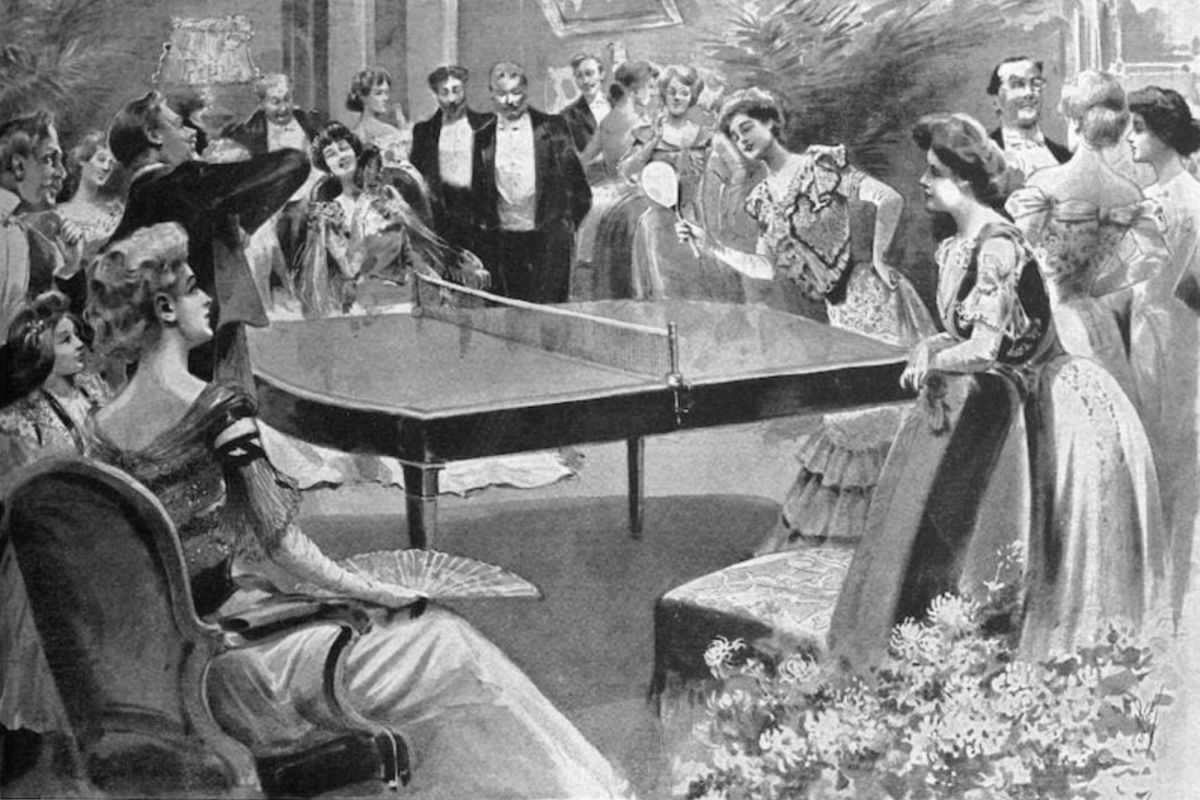 Optima Lakeview® Apartments in Chicago, IL Victorian-era party with elegantly dressed people, trending around a grand piano in a lavish room.