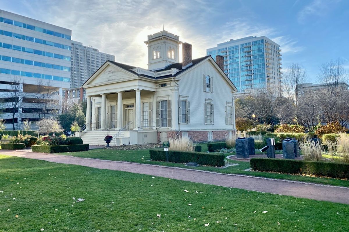 Optima Lakeview® Apartments in Chicago, IL The Clarke-Ford House, Chicago's oldest home, features columns and gardens amid the city's modern skyline.