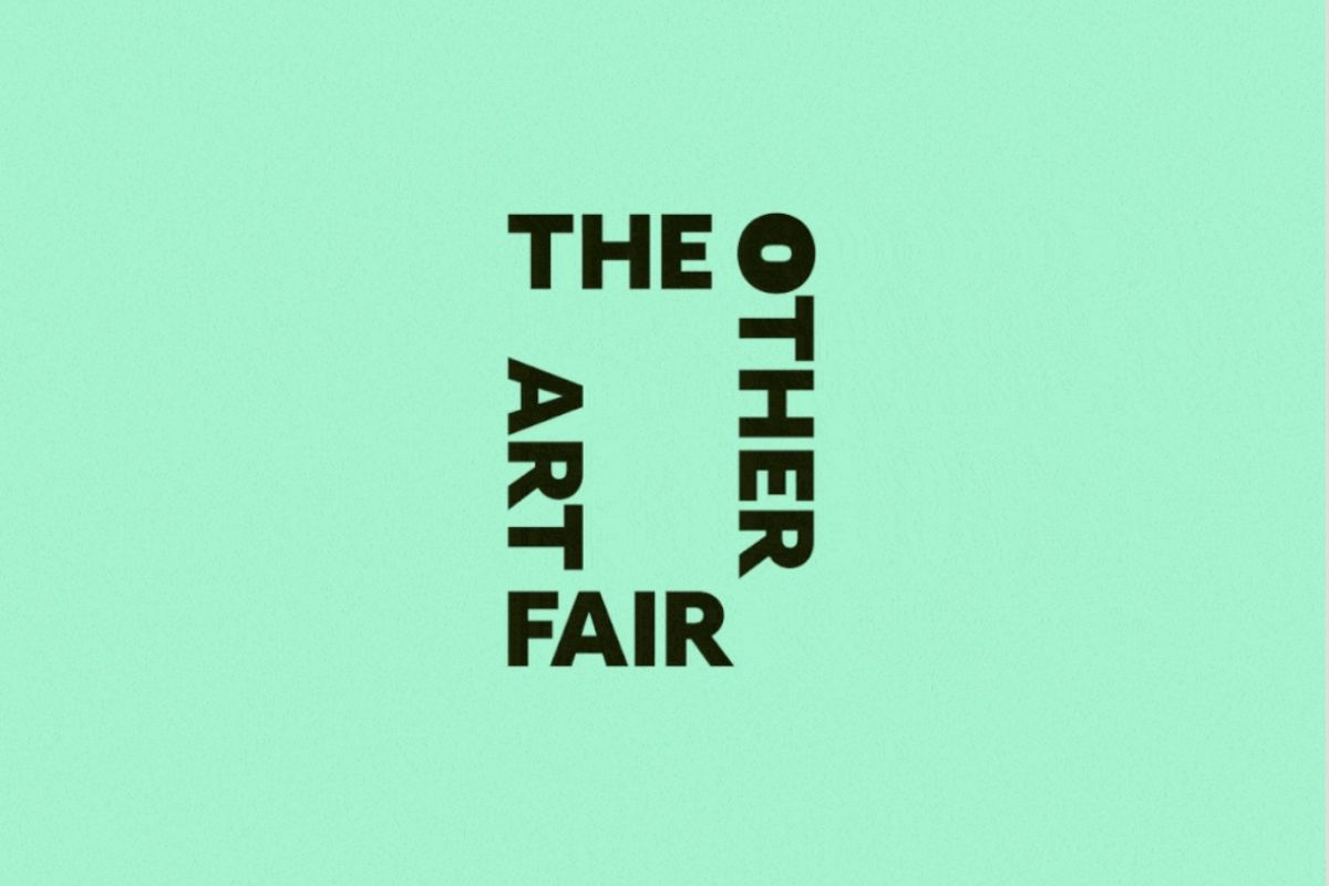 Optima Lakeview® Apartments in Chicago, IL Black text reading "The Other Art Fair" arranged in a square on a light green background, inspired by Chicago's Ravenswood Neighborhood.