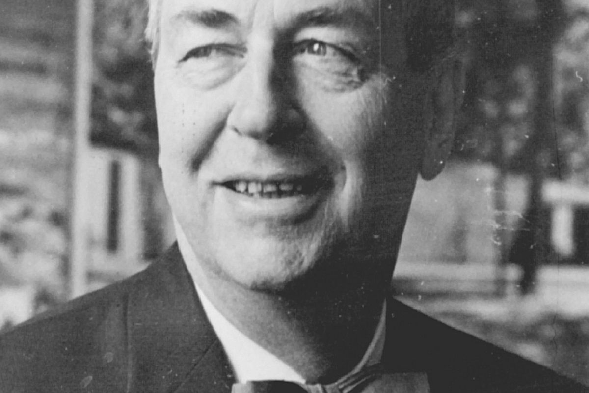 Optima Lakeview® Apartments in Chicago, IL Black and white photo of Modernist Master George Frederick Keck in a bow tie, smiling, with "Watertown Historical Society" text.