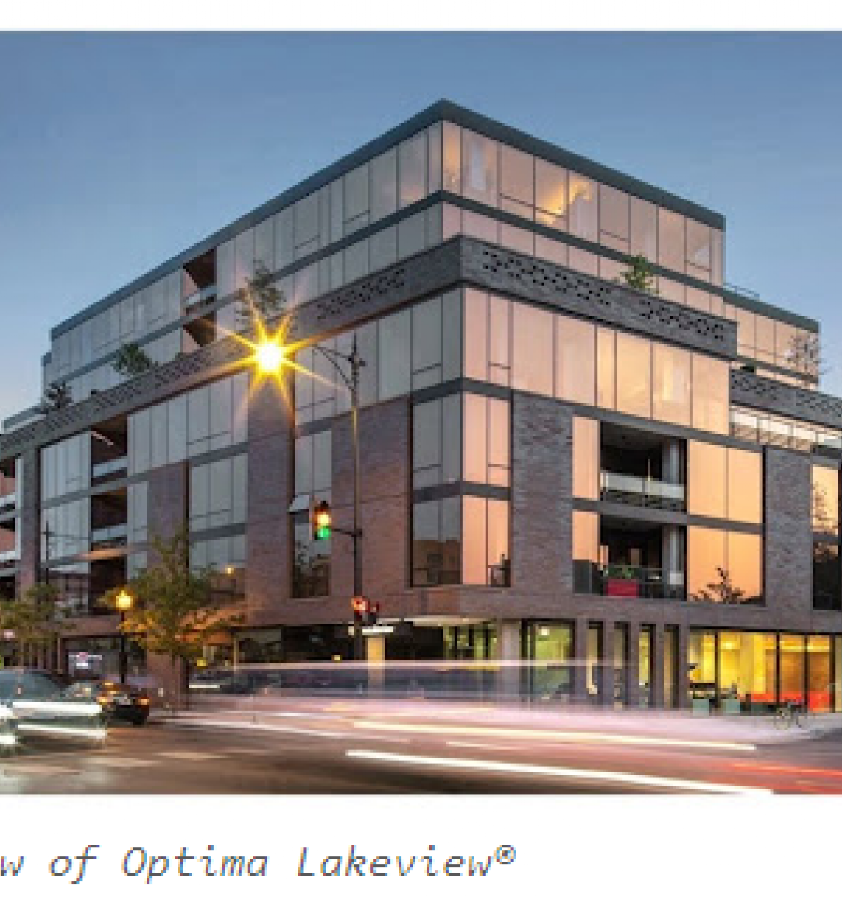 Optima Lakeview® Apartments in Chicago, IL Modern glass and brick apartment building at dusk, showcasing green architecture at the Optima Lakeview intersection.